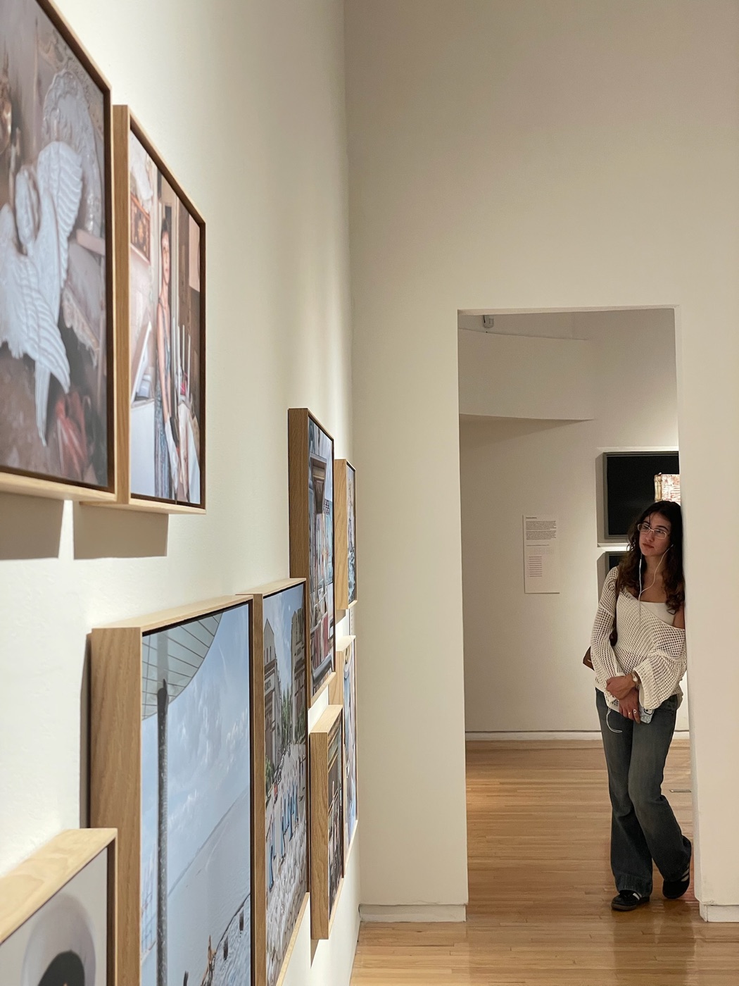 Standing in a doorway of a photography gallery